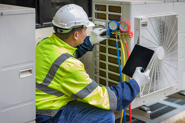 Professional Heat Pump Repair technician working in Keene, TX